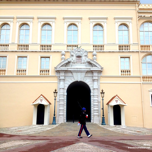 A guard walks the entrance ground of the Palace.